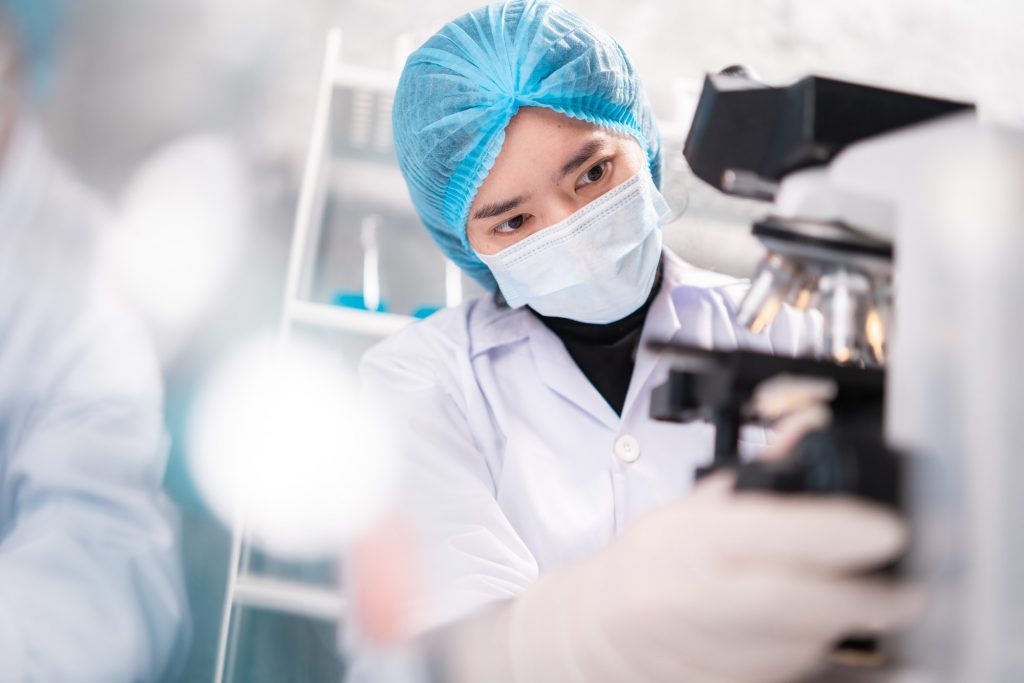 Health care researchers working in life science laboratory, medical science technology research