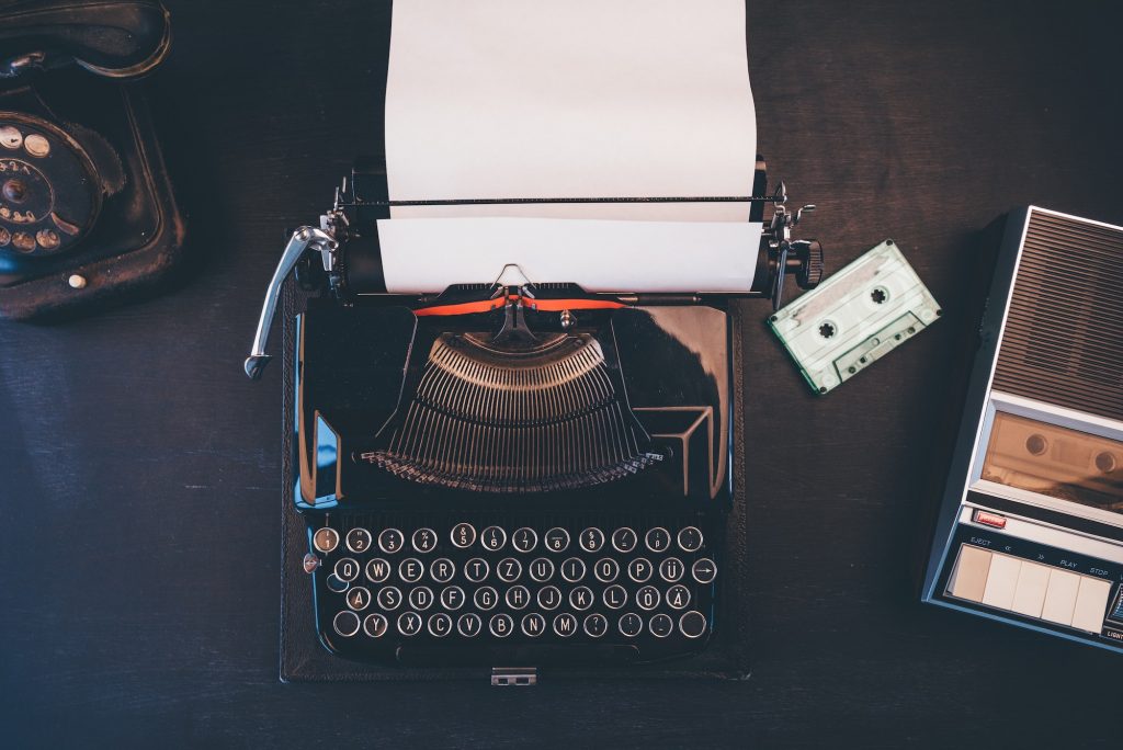 Top view of vintage journalist workspace